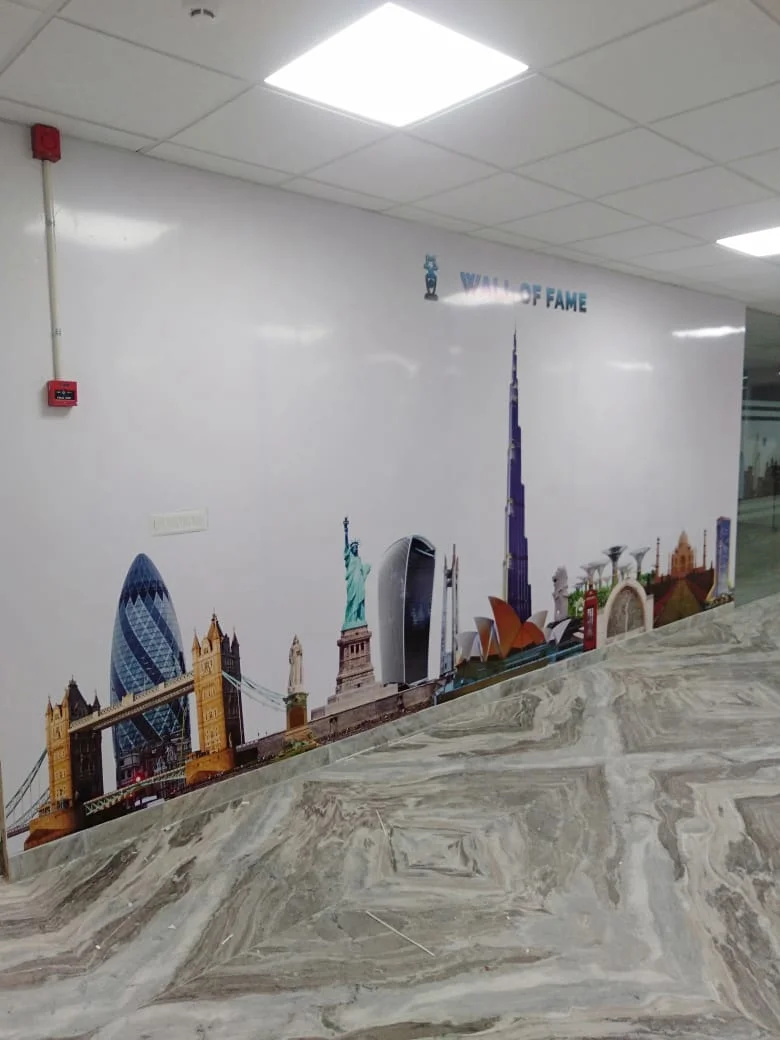 Professional craftsman installing decorative privacy glass film